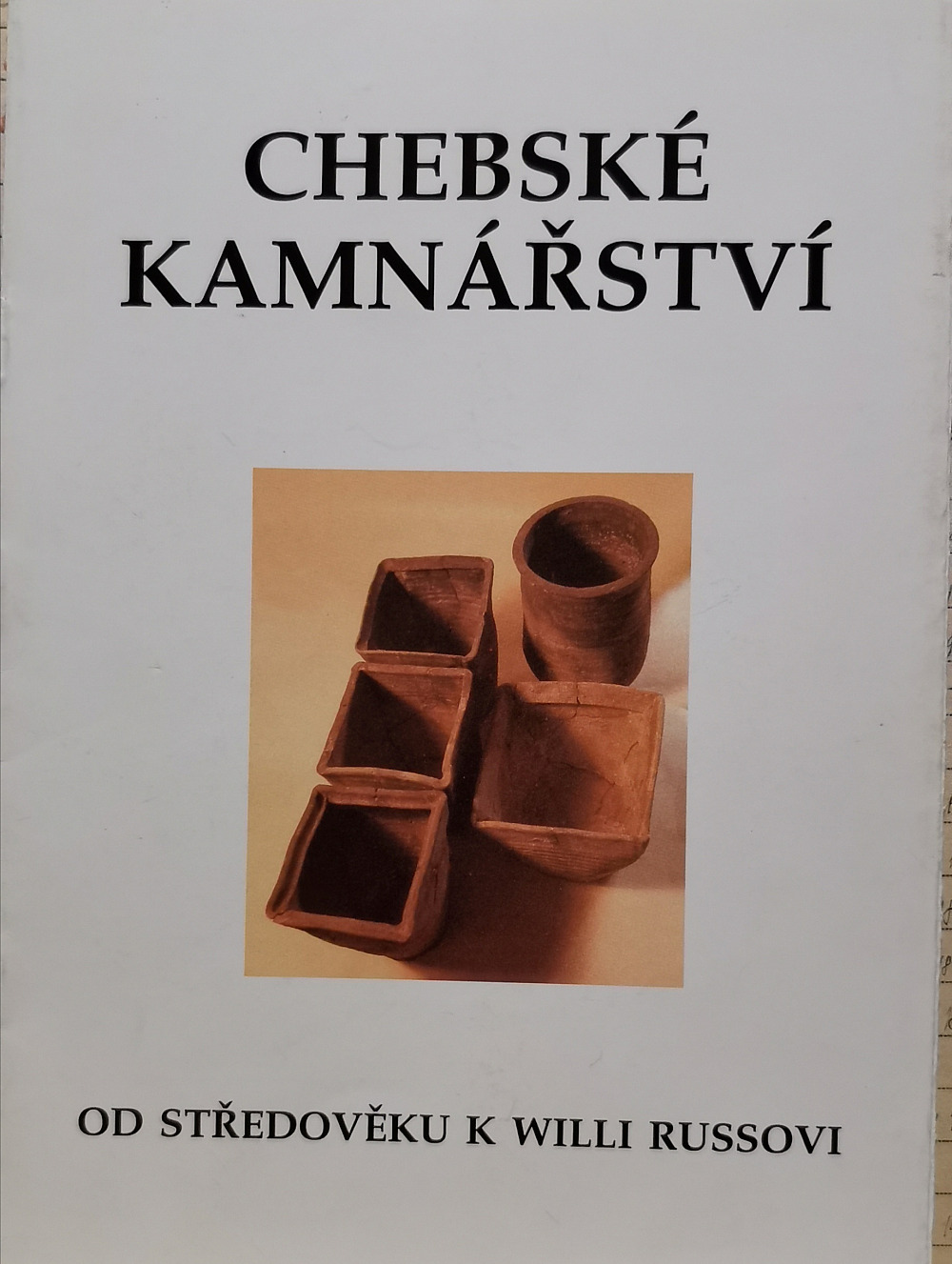 Chebské kamnářství od středověku k Willis Russovi